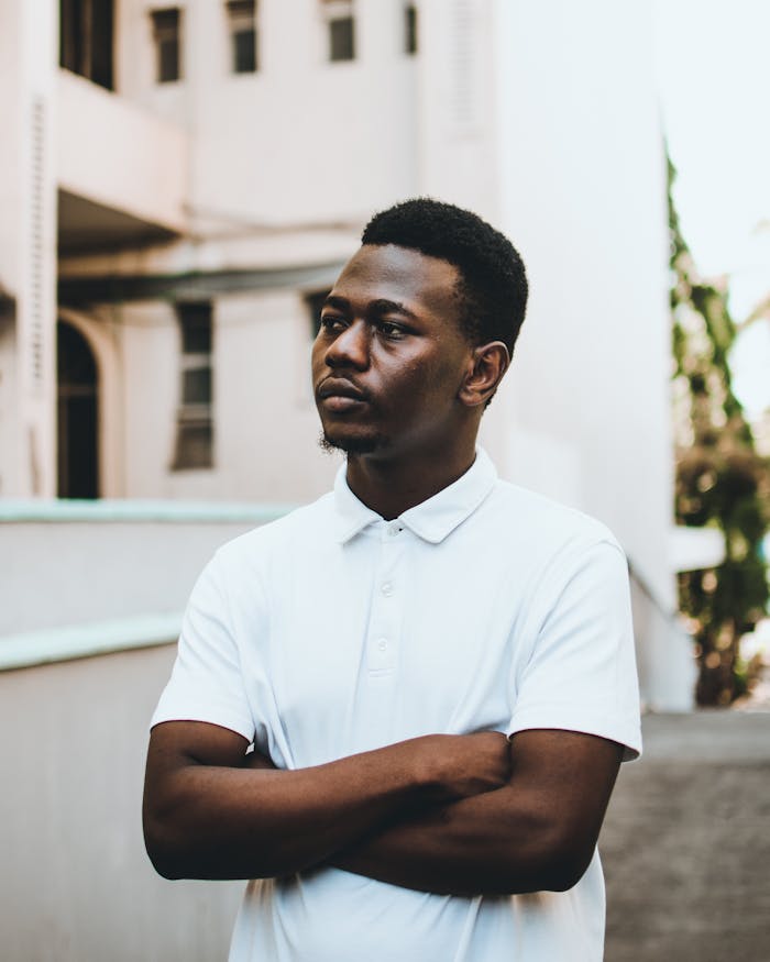 Man Wearing White Polo Shirt